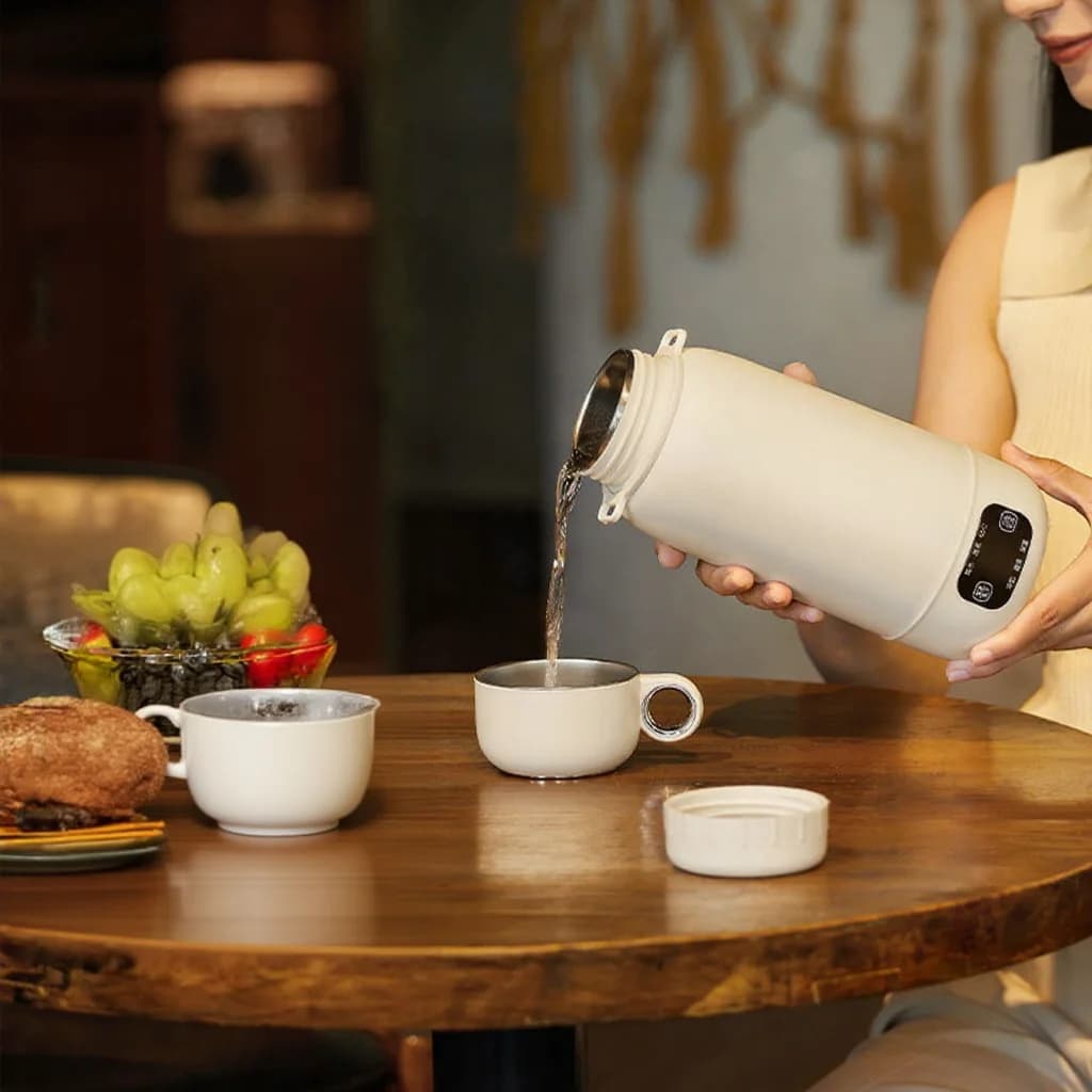 Hervidor eléctrico portátil de viaje con taza calentada 1L 316 acero inoxidable