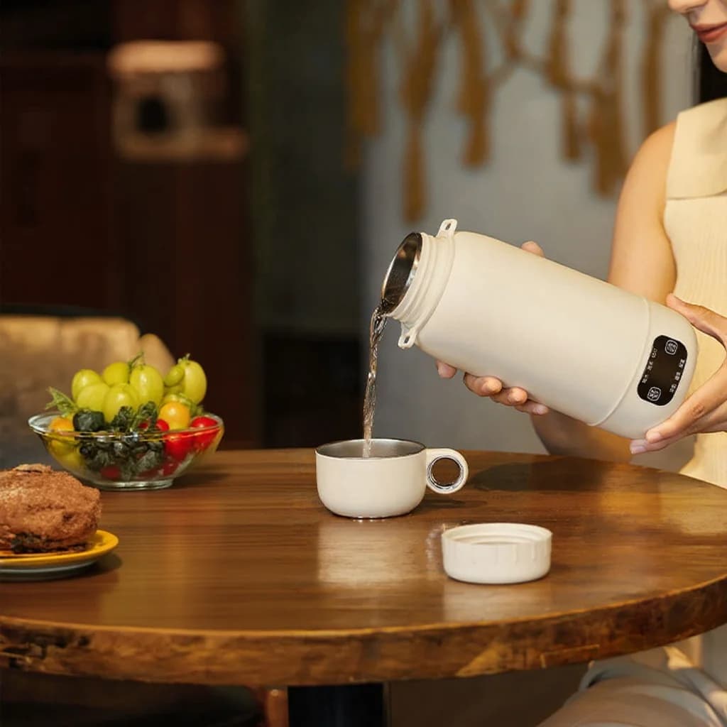 Hervidor eléctrico portátil de viaje con taza calentada 1L 316 acero inoxidable