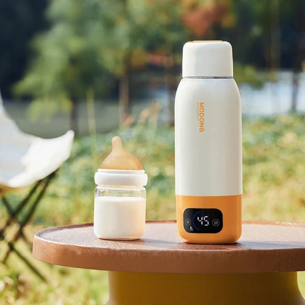 Taza eléctrica portátil para calentar agua para leche de fórmula 550ml