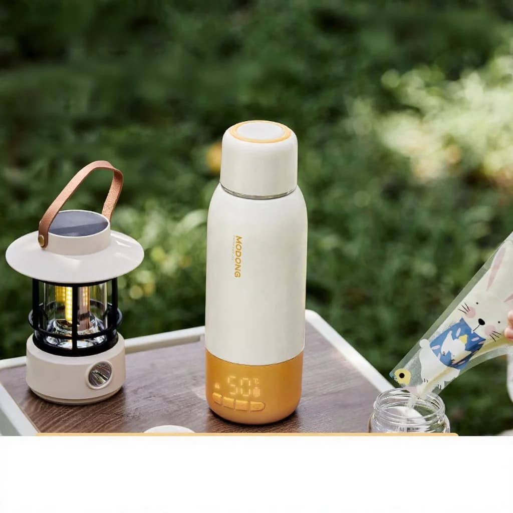 Taza eléctrica portátil para calentar agua para leche de fórmula, 550ml